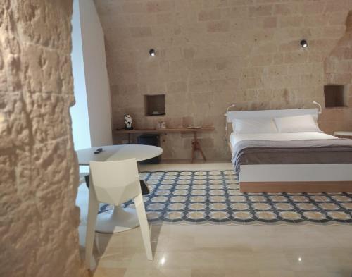 Ένα ή περισσότερα κρεβάτια σε δωμάτιο στο Apartments for you Sassi