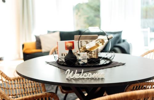 a black table with a bunch of items on it at Feel Home Apartments 701 - Seesicht - Terrasse - Parkplatz in Emmetten