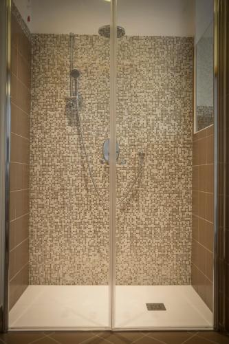 Ένα μπάνιο στο Aparthotel Dolomites Living&Relax