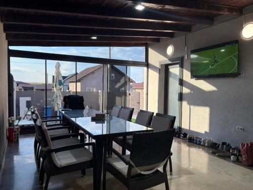 TV a/nebo společenská místnost v ubytování Casa George