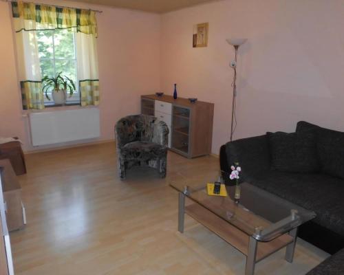 Ruang duduk di Ferienwohnung Für 4 Personen Ca 55 M Sup2 In Sayda, Mittelgebirge Deutschland Erzgebirge