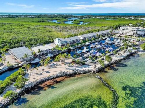 an aerial view of the marina at the resort at KAWAMA J3 in Key Largo, Beach, Lagoon, Pools, Tennis, Free Bikes and Canoes in Key Largo