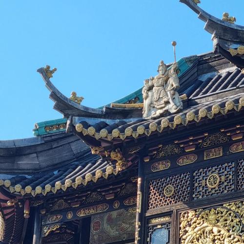 a roof of a building with a blue sky in the background at Chinese Pavilion Park - Magnificent Apartment Brussels in Brussels