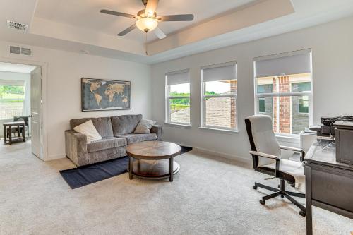 a living room with a couch and a table at 8 Mi to Celebration Station Family Getaway! in Mesquite