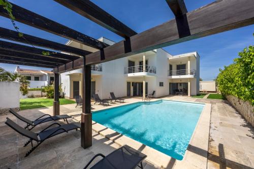 an image of a villa with a swimming pool at Montinhos Nature Stay in Luz