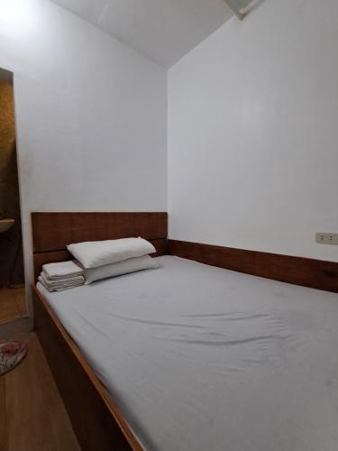 Cama o camas de una habitación en San Juan Hostel