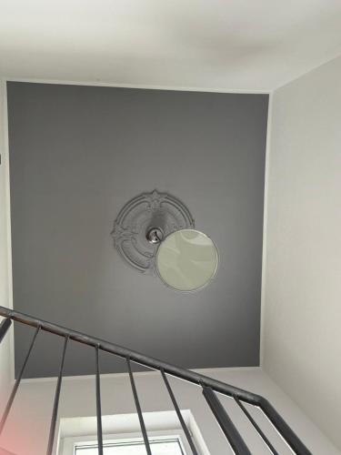 a staircase with a light on the ceiling at Landliebe Nummer 10 in Braubach