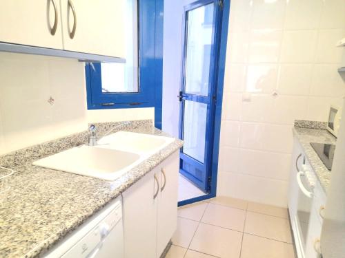 a bathroom with a sink and a shower at BEACH VALENCIA LUXURY D15-21 Apartment with terrace and sea views with two rooms in Valencia