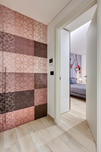 Una cama o camas en una habitación de Elysium III