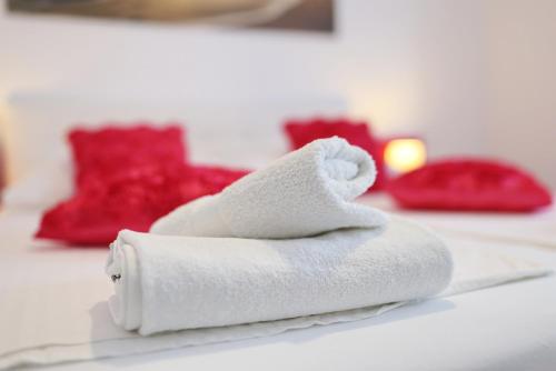 Ένα ή περισσότερα κρεβάτια σε δωμάτιο στο Apartments ROSINI, 300m from the beach with shared tavern and bikes, Nin