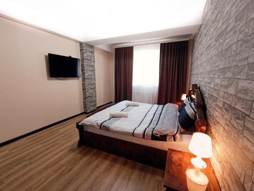 Katil atau katil-katil dalam bilik di Apartmentrent