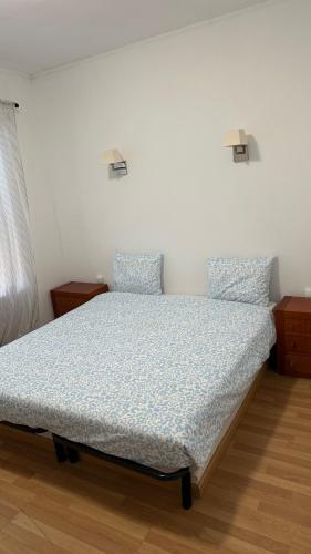 a bed in a bedroom with two pillows on it at Sweet Dreams in Albufeira