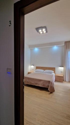 Ένα ή περισσότερα κρεβάτια σε δωμάτιο στο Maison de Teresa