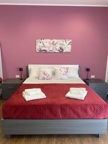 Katil atau katil-katil dalam bilik di Palermo Flowers Suites