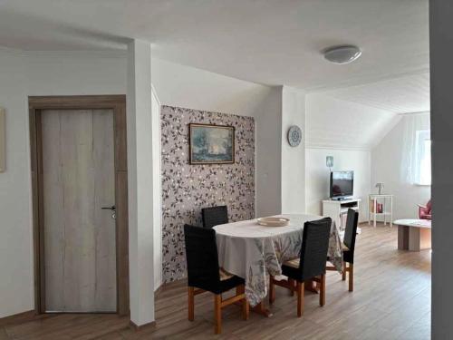 A television and/or entertainment centre at Apartment in Balatonbereny/Balaton 18047