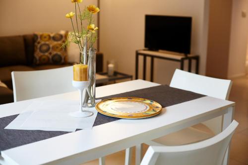 Televisyen dan/atau pusat hiburan di Villa Dapper Apartment 3