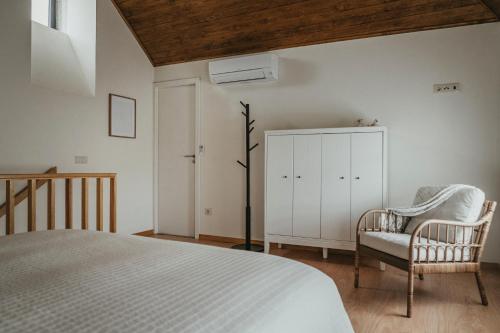 Postel nebo postele na pokoji v ubytování Abrigos do Castelo
