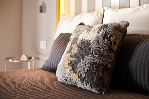 Katil atau katil-katil dalam bilik di Villa Dapper Apartment 3