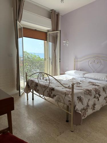 Katil atau katil-katil dalam bilik di Ottaviano B&B