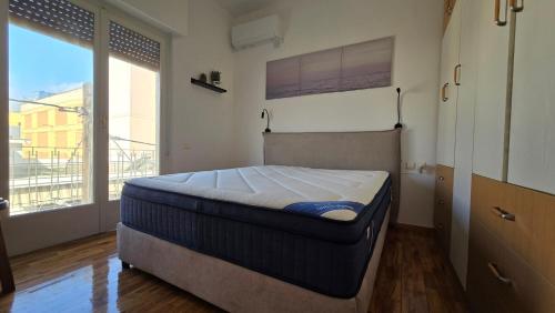 Ένα ή περισσότερα κρεβάτια σε δωμάτιο στο Pilion Horizon Apartment