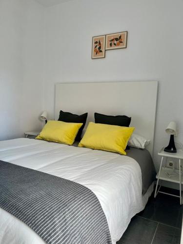 En eller flere senge i et værelse på Apartamento turístico Vallecas