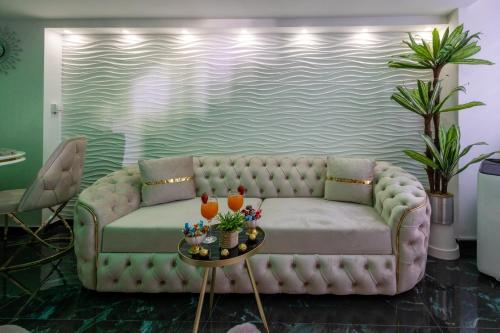 a living room with a couch and a table at Matija Lux2 in Kraljevo