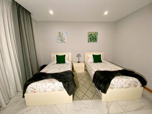 Ένα ή περισσότερα κρεβάτια σε δωμάτιο στο Iris House AL Azores