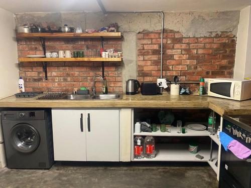 Køkken eller tekøkken på Rustic Industrial Maboneng Loft