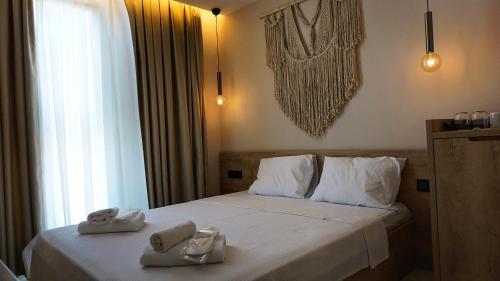 Katil atau katil-katil dalam bilik di Bohem Hotel