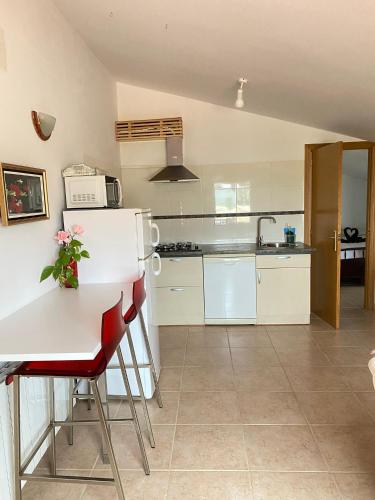 Η κουζίνα ή μικρή κουζίνα στο Appartement La Ponça