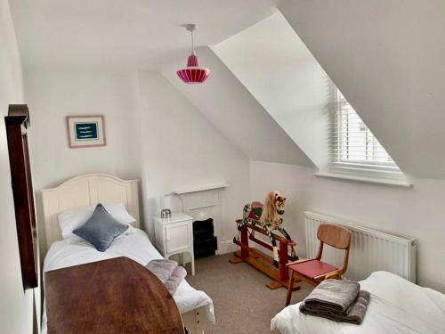 Postel nebo postele na pokoji v ubytování Heathcote Llandudno