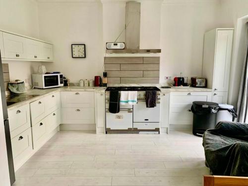 Kuchyň nebo kuchyňský kout v ubytování Heathcote Llandudno