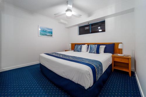 Ένα ή περισσότερα κρεβάτια σε δωμάτιο στο Mantra 1-Bedroom Apartment