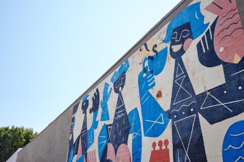 a mural on the side of a wall at The Davis Downtown San Diego in San Diego