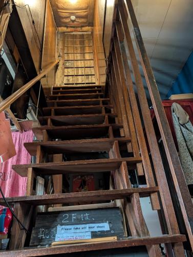 an overhead view of a staircase in a room at 民泊カフェ Gootarian in Kumamoto