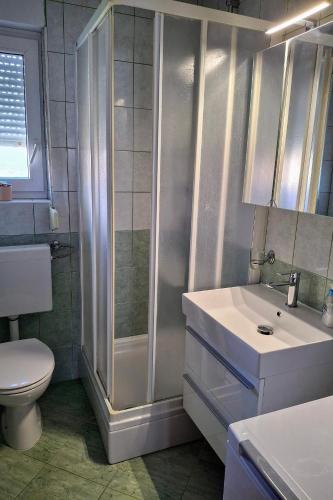 Apartments with parking space Palit, Rab - 24465