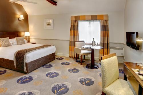Ein Bett oder Betten in einem Zimmer der Unterkunft Quy Mill Hotel & Spa, Cambridge