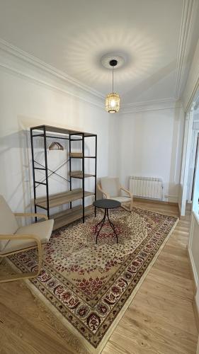 a room with a bunk bed and a rug at Pimo plus Entrerrios in Salas