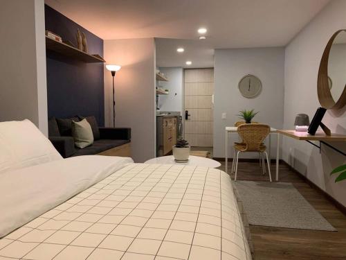 Katil atau katil-katil dalam bilik di Cómodo loft con lavadora wifi y parking