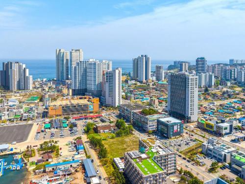 an aerial view of a city with tall buildings at Sokcho Mari Vista Hotel in Sokcho