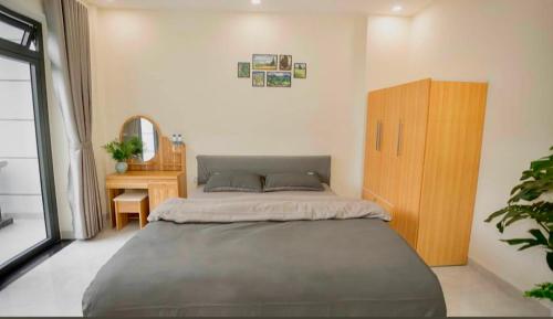 Postel nebo postele na pokoji v ubytování Amy Hotel & Apartment