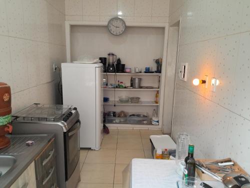 Kuchyň nebo kuchyňský kout v ubytování Hospedagem Domiciliar