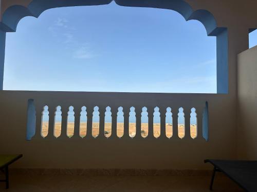 a wall with a blue light in a room at Villa MANSOURA in Driouch