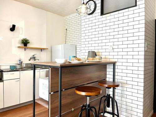Kuchyň nebo kuchyňský kout v ubytování INUYAMA BASE Vacation rental
