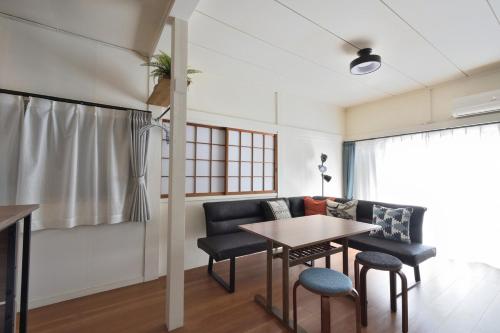 Posezení v ubytování INUYAMA BASE Vacation rental