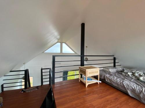 Llit o llits en una habitació de Villa Breeze