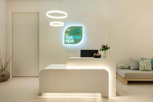 a waiting room with a sign that says tea tree spa at Holiday Inn Pattaya by IHG in Pattaya Central