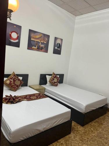 Ένα ή περισσότερα κρεβάτια σε δωμάτιο στο Hồng Trà Hotel Quảng Ninh