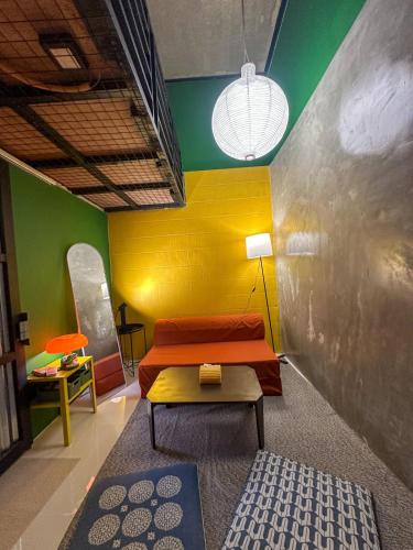 Ένα ή περισσότερα κρεβάτια σε δωμάτιο στο Elisa's Lofts La Union 12-pax