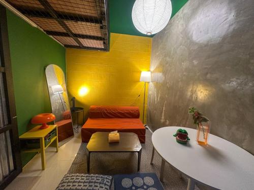 Ένα ή περισσότερα κρεβάτια σε δωμάτιο στο Elisa's Lofts La Union 12-pax